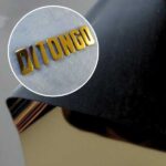 detalhe do filme de recorte 3D metálico dourado aplicado