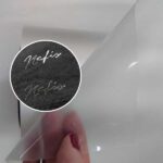 filme de recorte transparente 0,3mm aplicado em um tecido preto