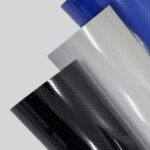 3 rolos de Filme de recorte PERFURADO alinhados. Filme de recorte perfurado azul, filme de recorte perfurado preto, filme de recorte perfurado branco