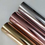 detalhe dos rolos de fita hot stamping para vidro nas cores dourado, cobre e prata